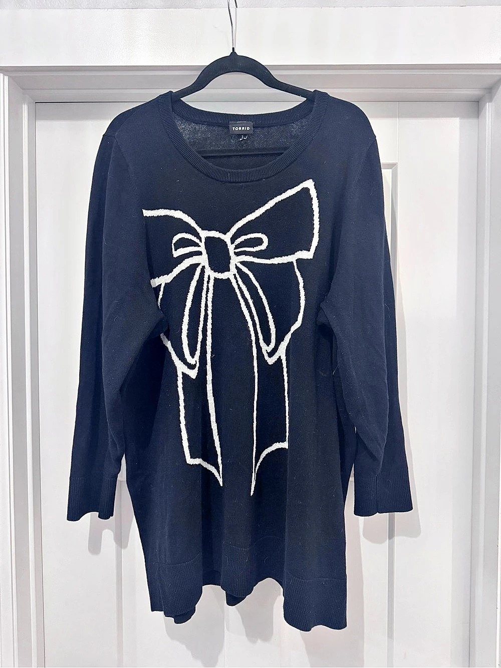 TORRID Black Crewneck Tunic Sweater with White Bow Motif